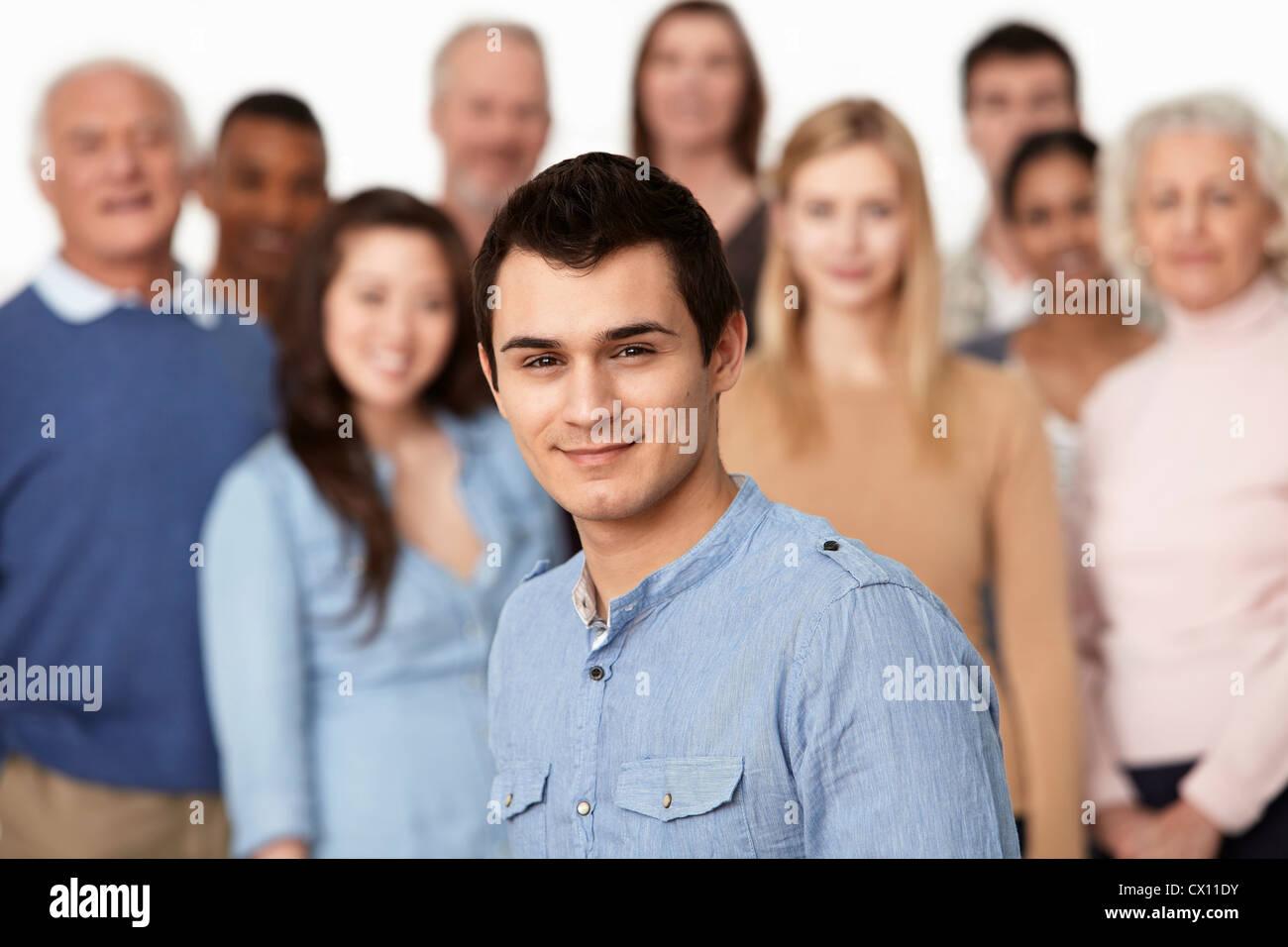 portrait-of-man-with-group-of-people-in-background-CX11DY.jpg